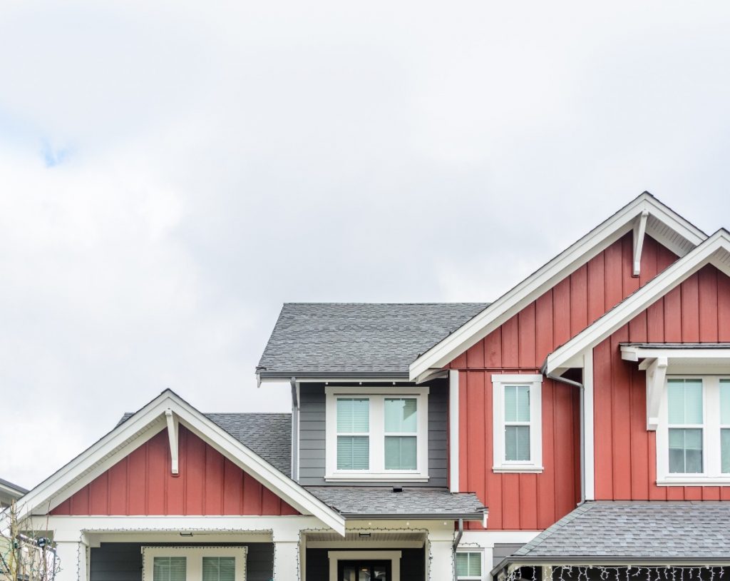 top of house exterior with board and batten gables and soffit